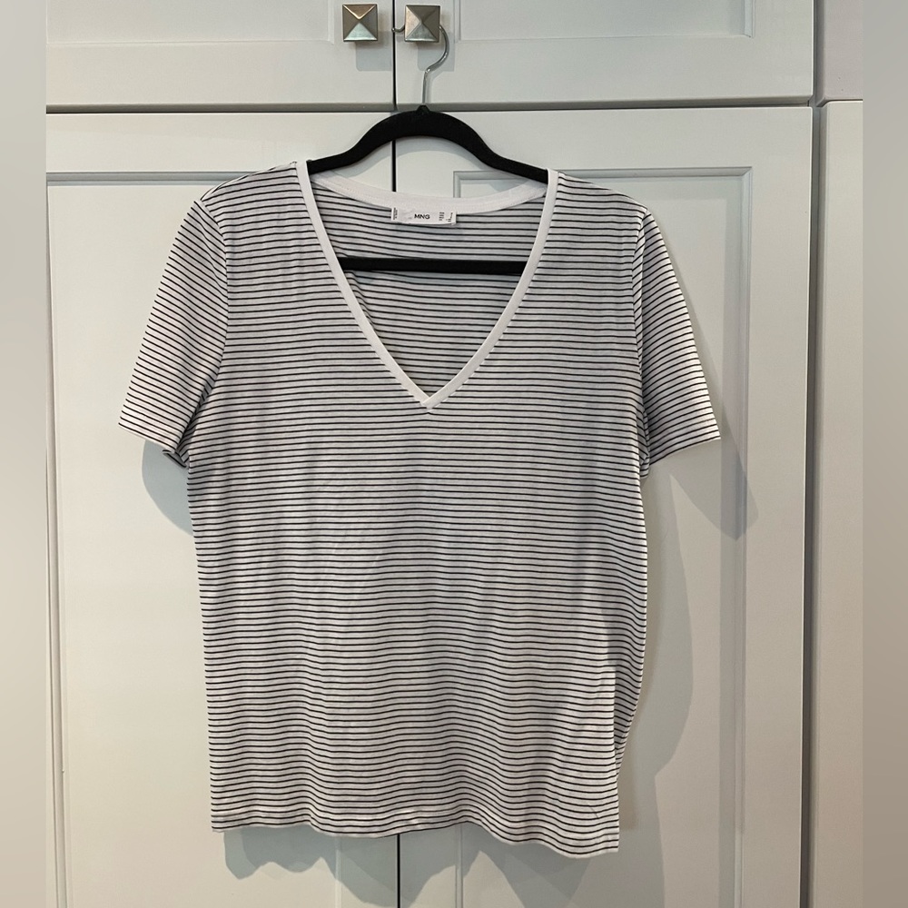 White and black striped tshirt size small